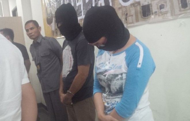 Fitriyani Andayani (35) SPG sekaligus pengedar narkoba yang kini diamankan oleh aparat kepolisian