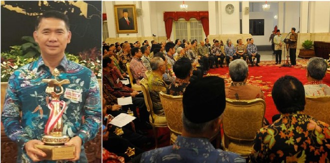 Walikota Jambi SY Fasha memegang Piala WTN yang diserahkan langsung oleh Presiden RI Joko Widodo di Istana Negara  Rabu (23/12)