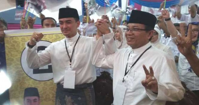 Pasangan Cagub Jambi terpilih Zumi Zola dan Fachrori Umar