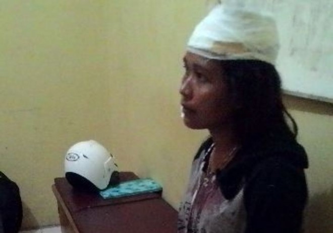 Korban Lia saat melapor di Polsek Telanaipura