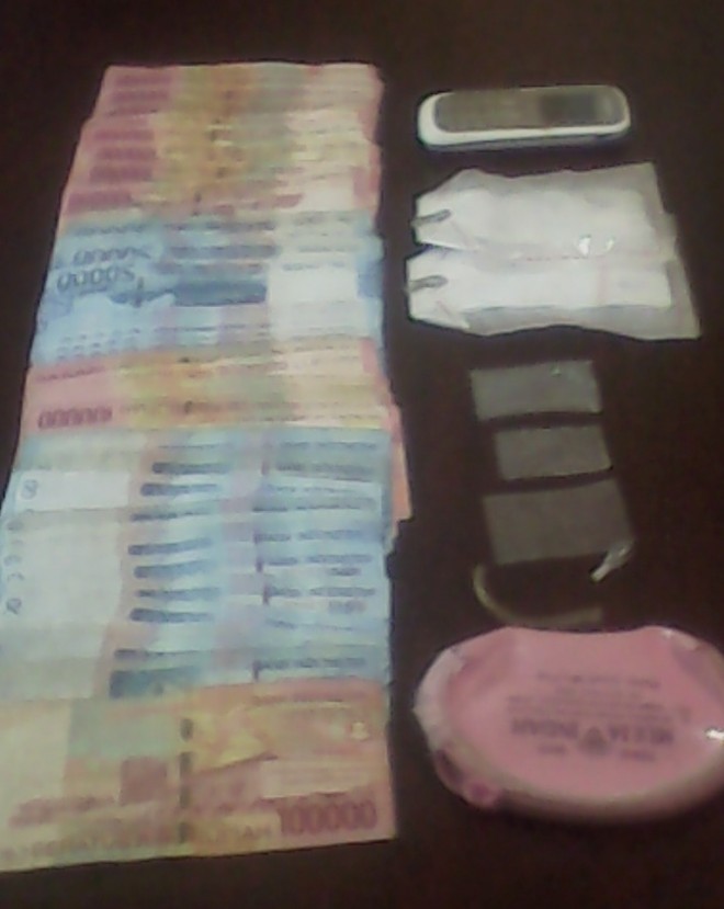 Barang bukti narkoba dan uang tunai milik IH yang diamankan anggota Polres Merangin.
