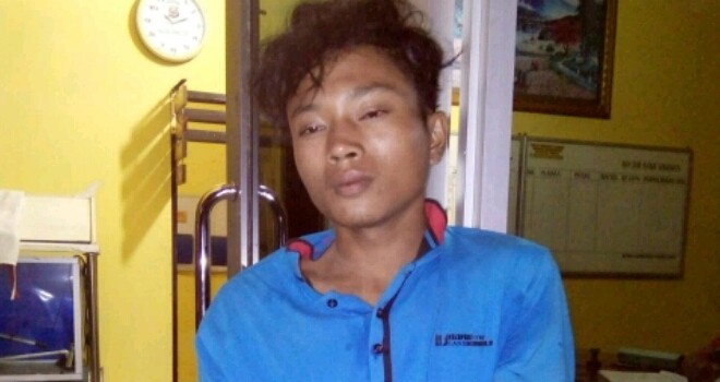 Sudir bin Senin(17), warga Dusun Kembang Bungo Desa Sungai limau tersangka yang babak belur dihajar masa.