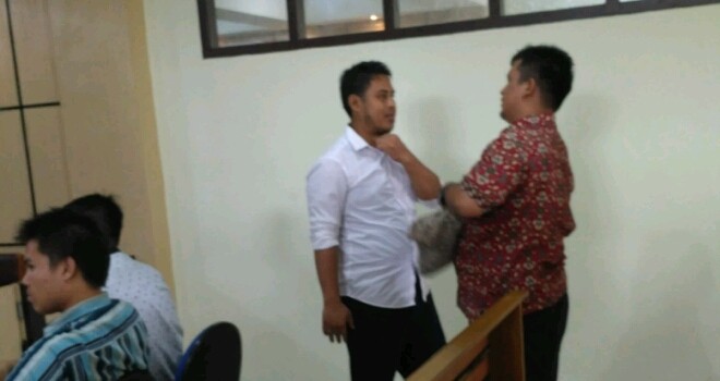Adji usai sidang putusan.