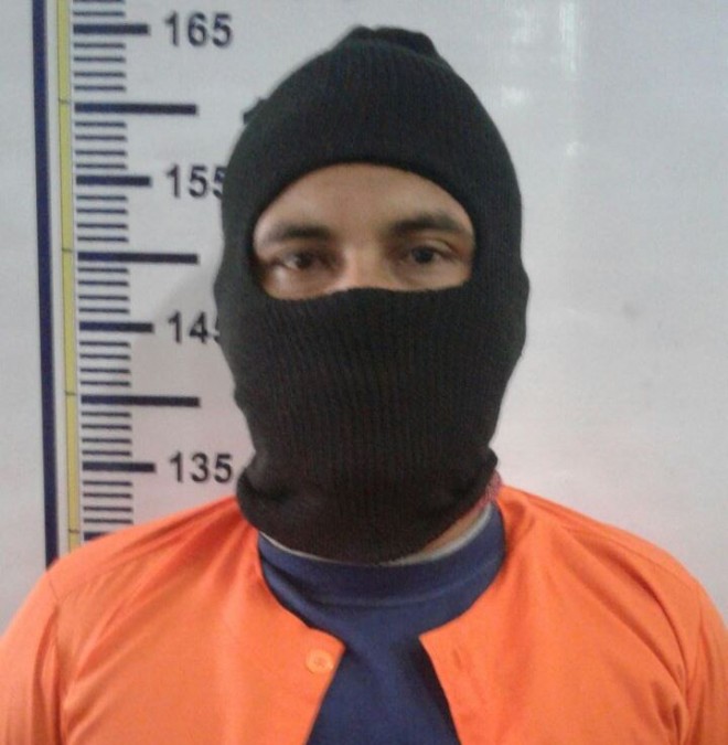 Tersangka IH usai diamankan polisi.