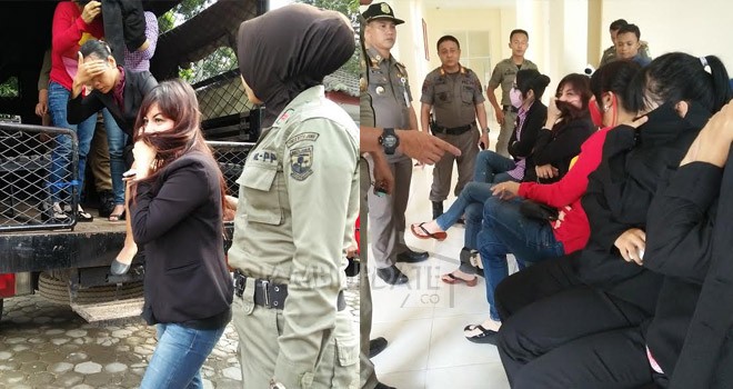 Satpol PP Kota Jambi saat menggiring wanita tanpa identitas.