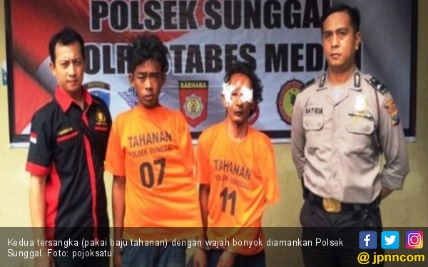 Kedua tersangka yang diamankan polisi. foto : pojoksatu
