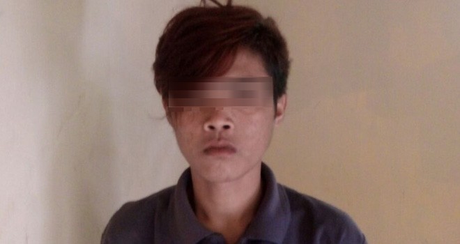 Tersangka Aman saat diamankan pihak kepolisian.