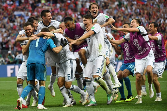 Rusia mencetak sejarah dengan lolos ke perempat final Piala Dunia 2018 usai menyingkirkan Spanyol (YURI CORTEZ / AFP)
