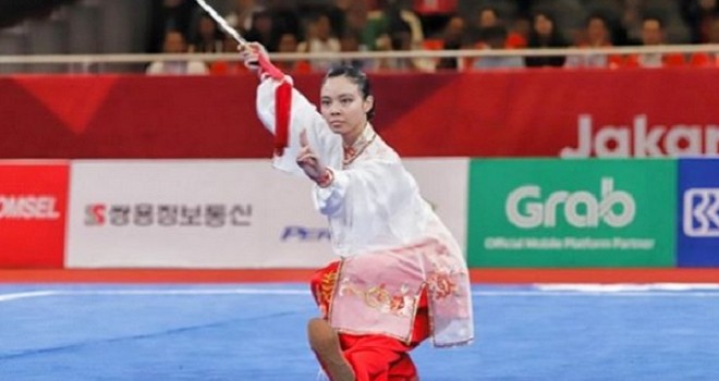 Atlet wushu putri Indonesia Lindswell Kwok meraih medali emas kedua untuk Indonesia di Asian Games 2018 (Issak Ramadhan/JawaPos.com)