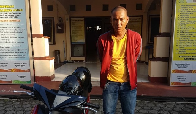 Pelaku Dedi Darmawan saat diamankan di Polsek Jelutung. Foto : Ist For Jambi Update