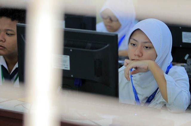 Ilustrasi pendaftaran SNMPTN (FUAD MUHAMMAD/Kaltim Post/Jawa Pos Group)
