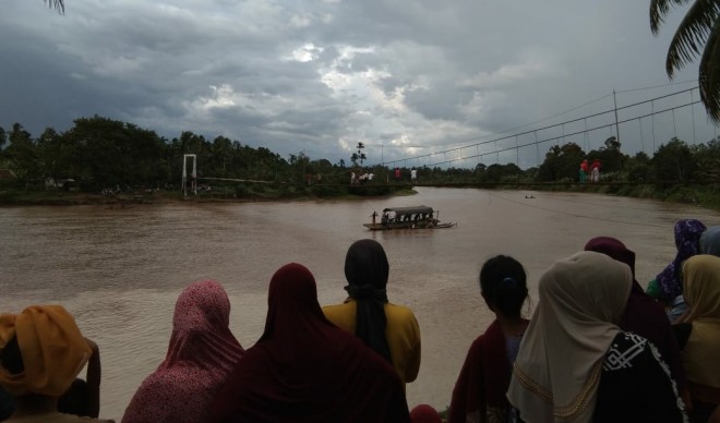 Pencarian  Wanita Paruh Baya di Bungo Terseret Arus Sungai. Foto : Ist