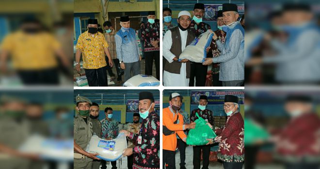  Pemerintah Kabupaten Kerinci membagikan Ribuan bantuan sembako murni dari sumbangan ASN secara simbolis kepada perwakilan penerima.