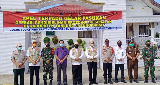 Bupati Tanjung Jabung Barat, Dr. Ir. H. Safrial MS pimpin langsung Apel Gabungan Pendisiplinan Protokol Kesehatan Kabupaten Tanjung Jabung Barat.
