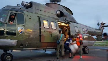 DROPING LOGISTIK. Pesawat Helikopter untuk melaksanakan SAR, Evakuasi, dan Droping bantuan logistik kepada masyarakat di Masamba Kabupaten Luwu Utara.