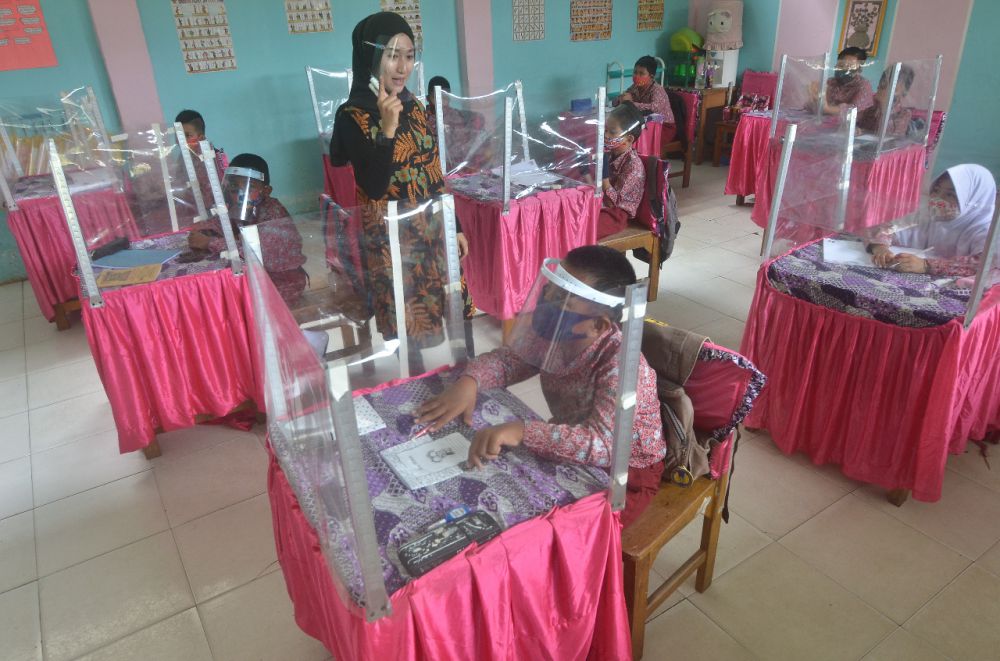 Siswa melakukan pembelajaran tatap muka beberapa waktu lalu. Kini Pemkot kembali memperpanjang belajar daring.