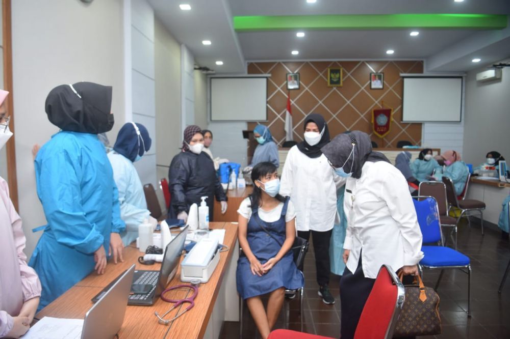 Salah seorang Ibu hamil mengikuti vaksinasi di Gedung PKK Kota Jambi (18/8) kemarin. 