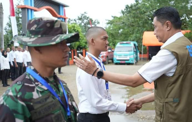 Pj Bupati Muaro Jambi Bachyuni Deliansyah saat membuka pelatihan pengembangan Kapasitas TRC BPBD Kabupaten Muaro Jambi.