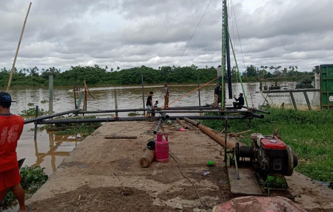 Dermaga Teluk Buan yang mulai progres perbaikan setelah hampir Satu tahun mengalami kerusakan akibat ditabrak Tugboat.